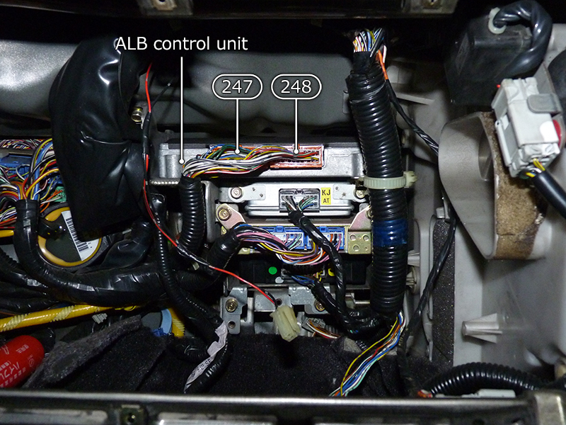 NSX ALB control unit location (behind the passenger glove box)